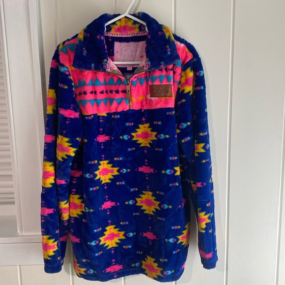Multi color, super soft sweater. Size medium.